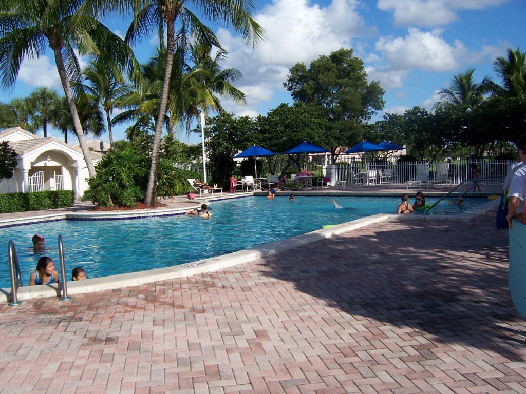 Luxury resort with tropical pool and palm trees